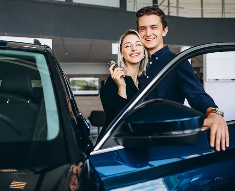 Alyson Auto Warranty customer with a representative beside a car